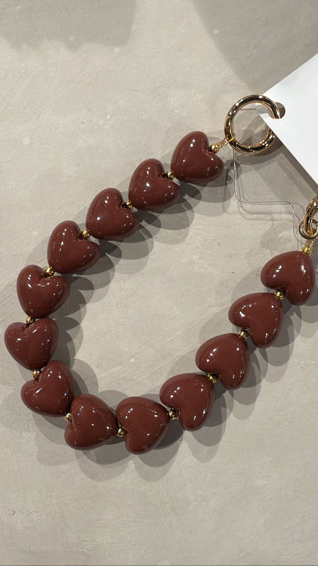 Telefoonkoord harten - bruin