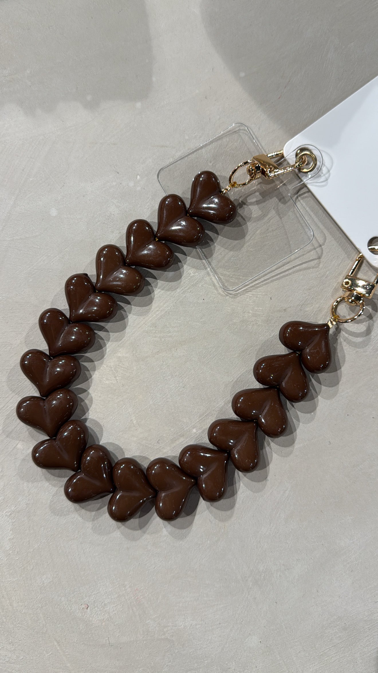 Telefoonkoord harten - bruin